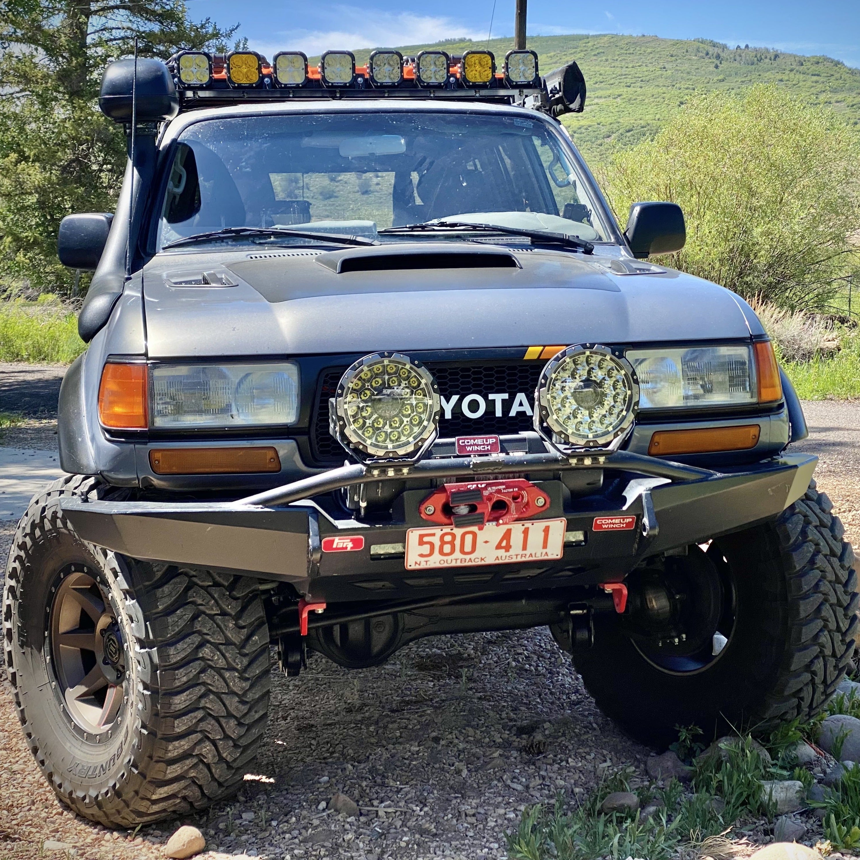  Land Cruiser with 4.5inch CUBE4 light pods on the roof rack and 9'' offroad  laser driving light on the front bumper